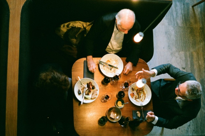 A dinner table seen from above, set and ready
